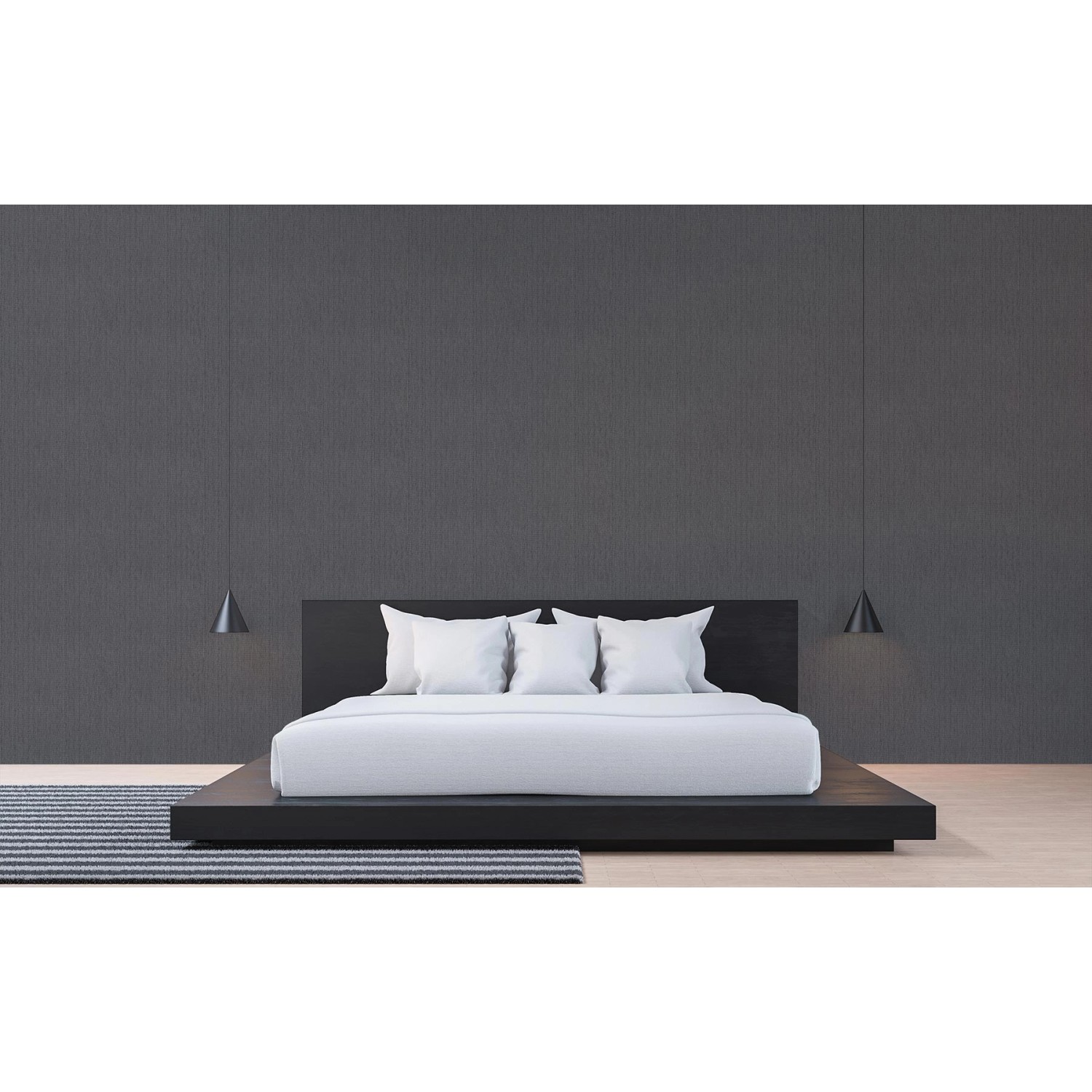 Schlafzimmer mit anthrazitfarbener Tadessi Vliestapete Uni M1 No 2500 als Wanddeko.