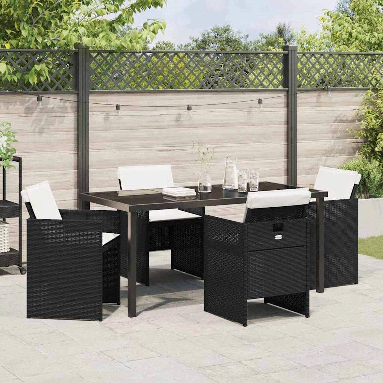 Schwarze 5-tlg. vidaXL Garten Essgruppe aus Poly Rattan mit Tisch und Stühlen.