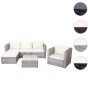 Graue Poly-Rattan Lounge-Garnitur Busto mit creme-farbenen Kissen und Tisch mit Glasplatte.