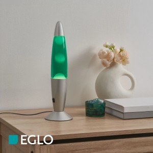 Eglo LED-Lavatischleuchte in Silber mit grüner Flüssigkeit und weißem Wachs auf Holztisch. Dekorativer Lava-Effekt.