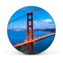 Runde, schwarze Magnettafel mit Golden Gate Bridge Motiv als Wanddekoration.