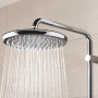 Grohe QuickFix Duschsystem Vitalio Start 250 Kopfbrause mit Wasserstrahl in Chromoptik.
