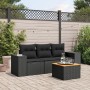 Schwarze 4-tlg. vidaXL Garten-Sofagarnitur aus Poly Rattan mit Tisch und Kissen.