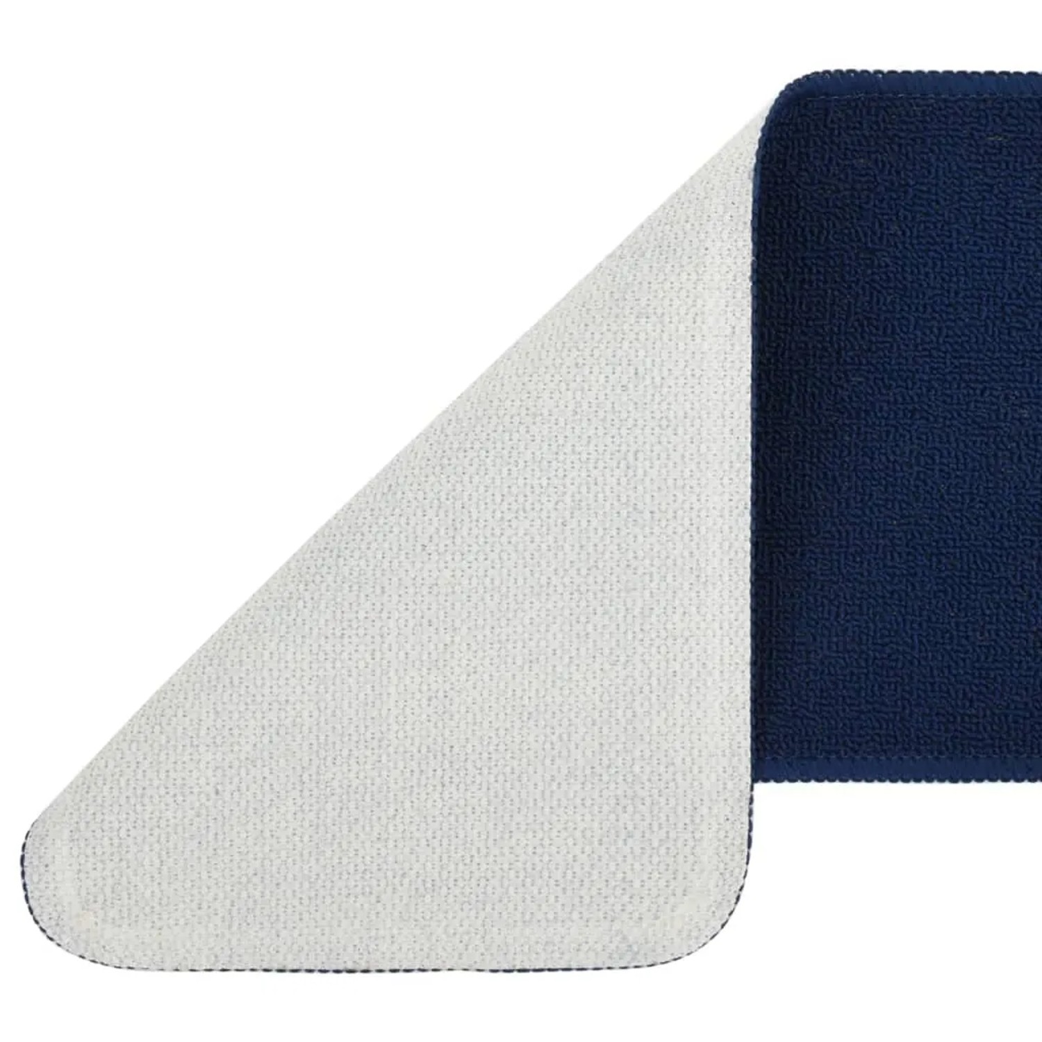 Marineblaue rechteckige Stufenmatte aus PP, 20x75 cm, mit umgeschlagener Ecke zeigt weiße Antirutsch-Latex-Unterseite.