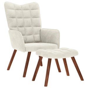 Cremefarbener Relaxsessel mit Hocker, Samtbezug und Holzfüßen.