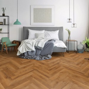 Verlegtes Classen Ville Laminat in Eiche Benicarlo im Fischgrätmuster im Schlafzimmer.