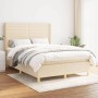 Cremefarbenes Boxspringbett 140x190 cm mit Matratze und hohem Kopfteil. Gemütliches Bett für Schlafzimmer.