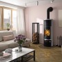 Justus Faro Aqua 2.0 Kaminofen Speckstein, schwarz-grau, 8,5 kW in Wohnraum-Szene.