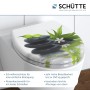 Schütte WC-Sitz Jasmin mit Absenkautomatik und Stein-Motiv auf einem WC.
