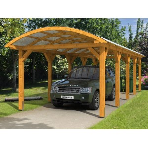 Skan Holz Carport Franken, Eiche hell, mit Auto. Bogendach-Carport aus Holz mit Doppelstegplatten.