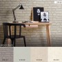 A.S. Création Tapete Stein-Optik Creme-Beige im Arbeitszimmer mit Schreibtisch und Stuhl.