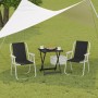 Schwarzer WOLTU Klapptisch mit zwei Campingstühlen auf Rasen. Ideal für Camping & Outdoor.