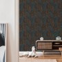 A.S. Création Vliestapete Dschungel, schwarz/orange, im Wohnraum mit Hund.