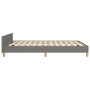 Dunkelgraues Stoff-Bettgestell 140x190 cm mit Kopfteil. Bett mit Holzlattenrost und Füßen.