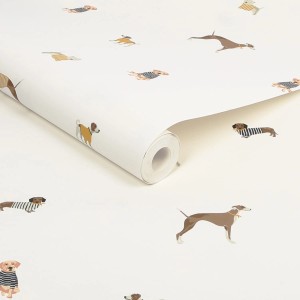 Joules Vliestapete Harbour Dogs Crème: Rolle mit Hunde-Motiv in Creme, Blau und Gelb.