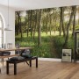 Vlies Fototapete Blütenzauberwald (450x280 cm) im Wohnraum mit Esstisch und Dekoration.