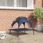 Marineblaues vidaXL Hundebett aus Stahl mit Sonnendach auf Holzterrasse. Erhöhtes Outdoor-Hundekörbchen.
