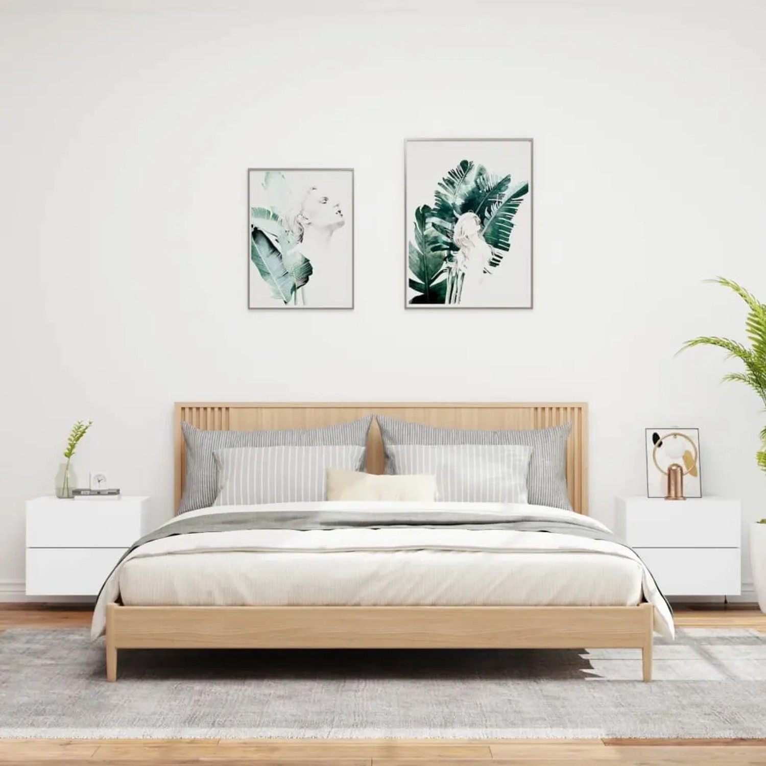 Zwei weiße Wand-Nachttische mit LED-Beleuchtung neben einem Bett.