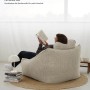 Beiger mokebo Cord Sitzsack Sessel 'Der Lümmel' mit Person beim Lesen, Kategorie Gartenstühle.