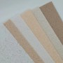 Floxxan Baumwollputz Colorado 124, verschiedene Farbmuster der Flüssigtapete in Lichtgrau und Beige.