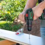Bosch Akku-Schlagbohrmaschine Advanced Impact 18V-80 beim Bohren in Holz.