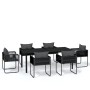 Schwarze 7-tlg. Garten-Essgruppe: Tisch mit Glasplatte und 6 Rattan-Stühle mit Kissen.