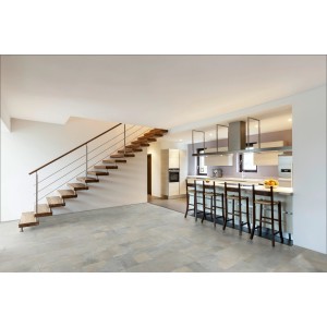 Classen Ceramin Fliese Neo Vario Marino in Steinoptik als Bodenbelag im Wohnraum mit Treppe und Küche.