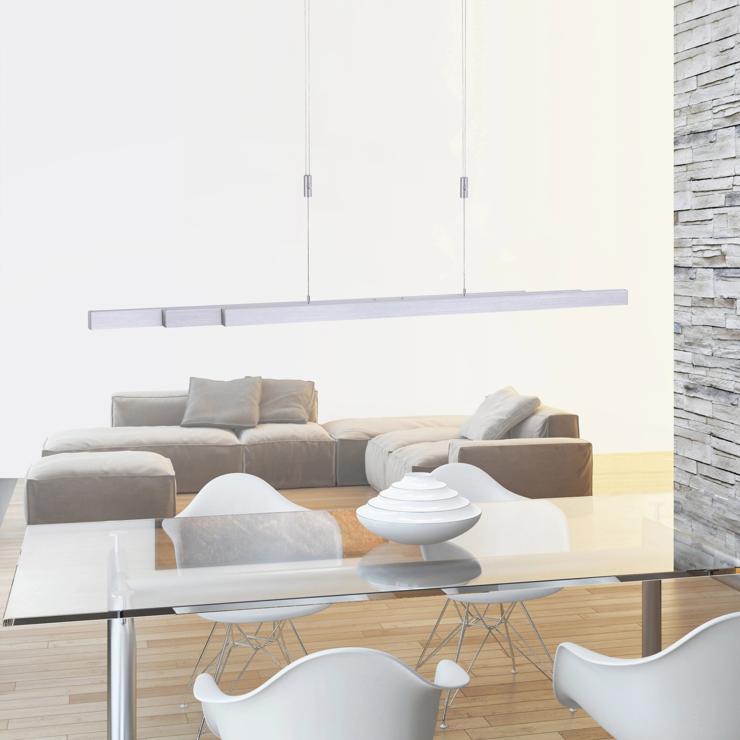 Moderne Paul Neuhaus LED-Pendelleuchte Adriana aus Aluminium, höhenverstellbar über Esstisch.