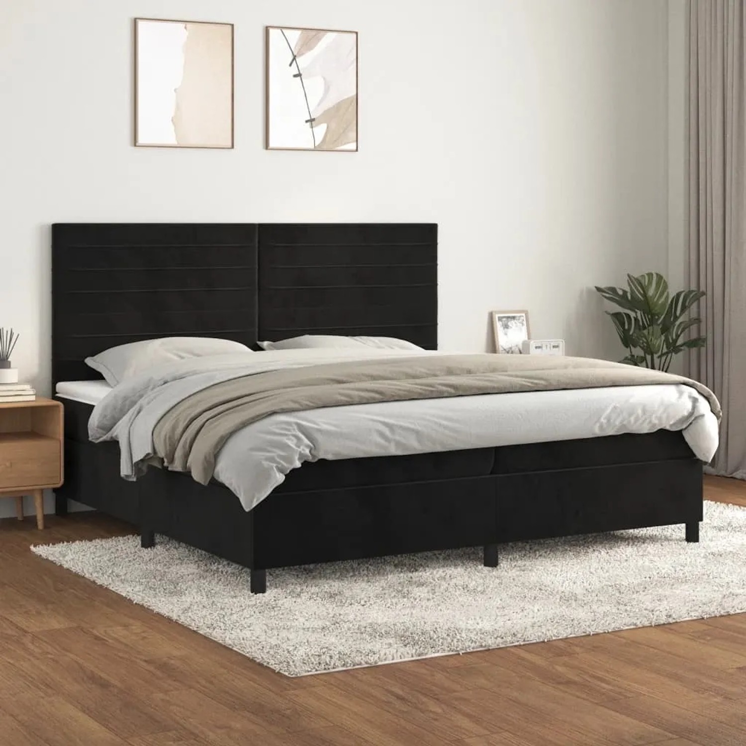 Schwarzes vidaXL Boxspringbett (200x200 cm) mit Matratze und Samtbezug im Schlafzimmer.