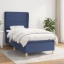Blaues Boxspringbett (90x200 cm) mit Matratze und Stoffbezug. Bett mit hohem Kopfteil.