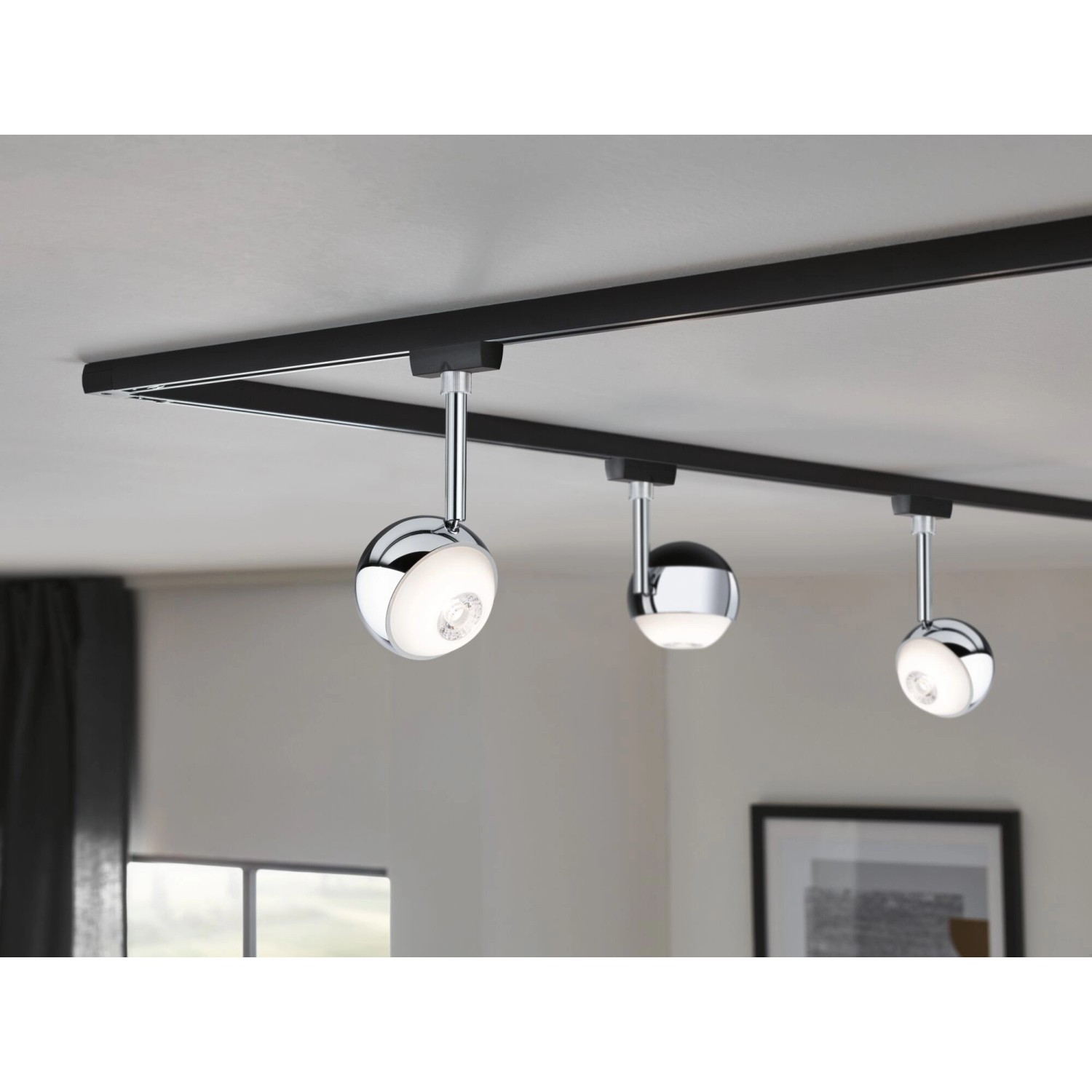 Paulmann Urail LED Schienensystem mit drei dimmbaren Spots in Schwarz Matt-Chrom.