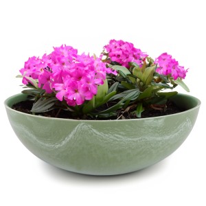 Olivgrüne, marmorierte Pflanzschale (25x9 cm) mit pinkfarbenen Blumen. Dekorative Pflanztöpfe für drinnen und draußen.