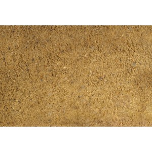 Nahaufnahme von beigem Mauer- und Putzsand (0-5 mm) als Schüttgut.