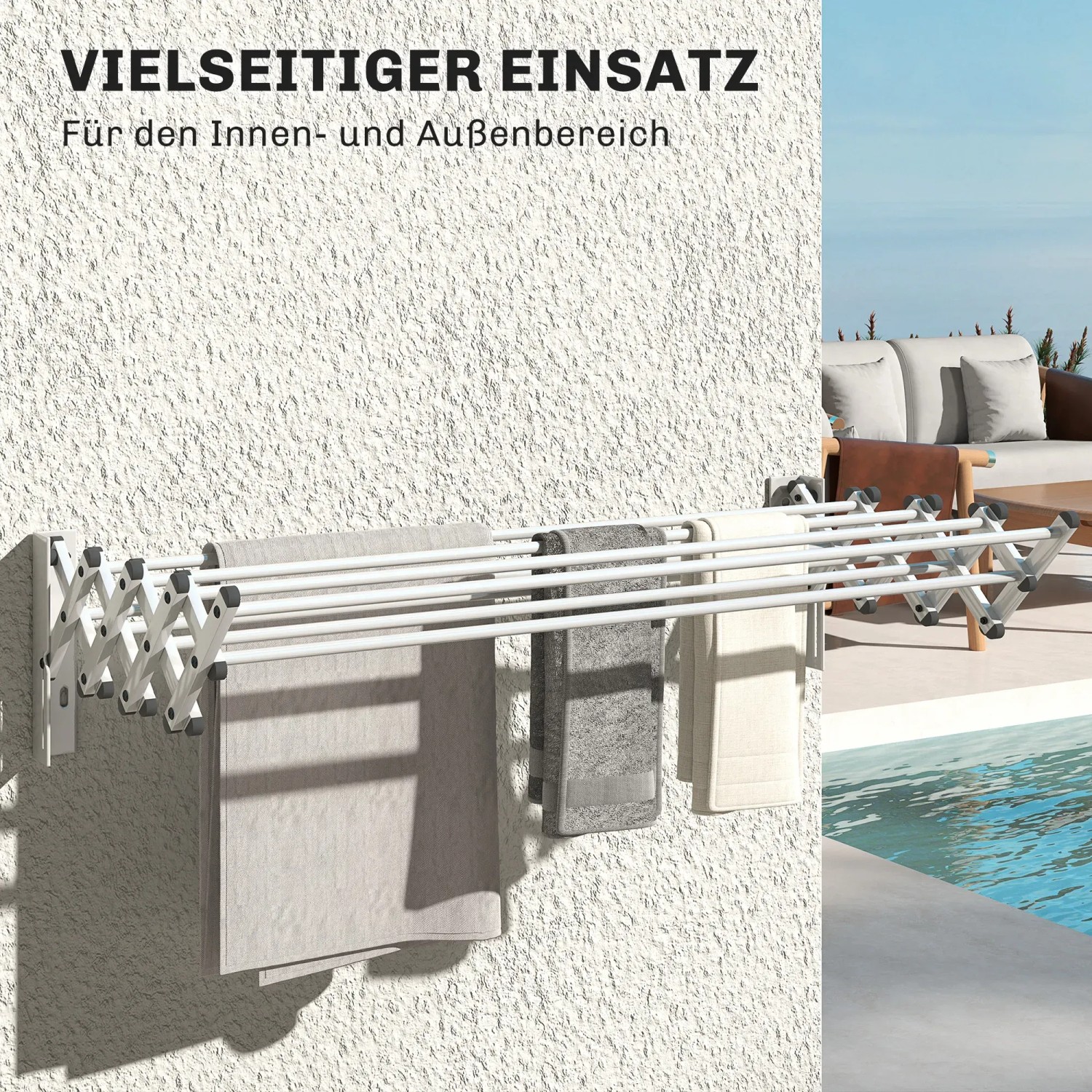 Ausziehbarer, silberner Wand-Wäscheständer mit Handtüchern, geeignet für Bad und Balkon.