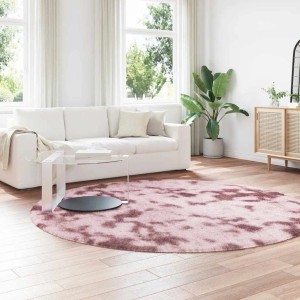 Runder vidaXL Shaggy Hochflorteppich NAVARRA in Altrosa mit Muster auf Holzfußboden im Wohnzimmer.