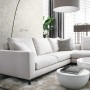 Beige Bambusblätter Tapete von Origin Wallcoverings im Wohnzimmer.
