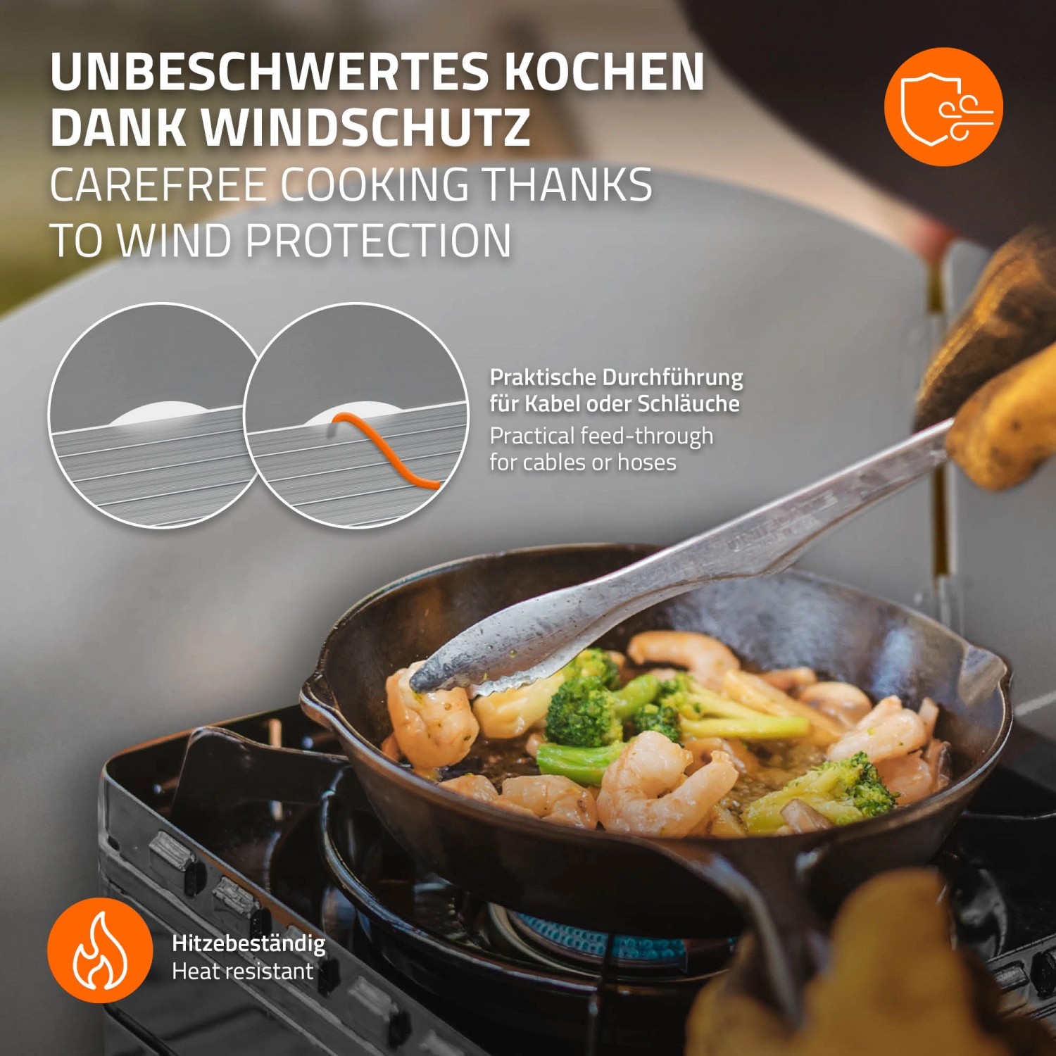 Hauki Camping Küche: Detailaufnahme von Kochen mit Windschutz und hitzebeständiger Platte.