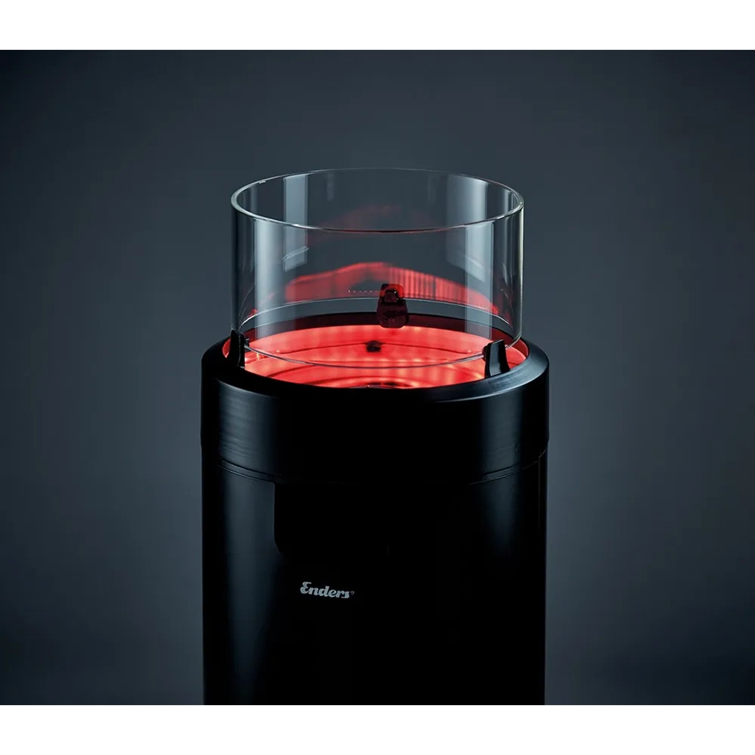 Enders® Nova LED M Feuerstelle in Schwarz-Chrom mit Glaszylinder und roter LED-Beleuchtung.