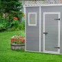 Keter Kunststoff-Gartenhaus in Anthrazit, 3,06 m², mit Fenster und Tür im Garten.