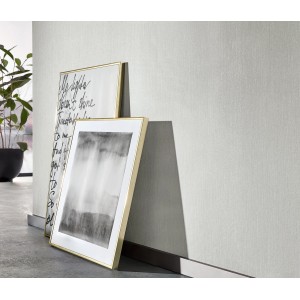 Helle, graue Erismann Vliestapete Uni von Guido Maria Kretschmer mit leichter Struktur und Glanz.