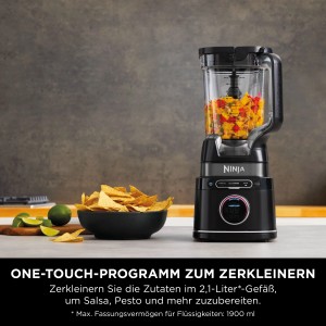 Schwarzer Ninja Mixer TB401EU mit Zutaten im Behälter, daneben Tortilla-Chips und Limetten.