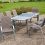 Merxx Gartenmöbel-Set Amalfi, 9-teilig, taupe, mit Ausziehtisch (180/240x100 cm) im Garten.