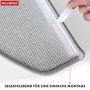 Detailaufnahme der grauen KARAT Stufenmatte London Pro mit Klebestreifen zur einfachen Montage.
