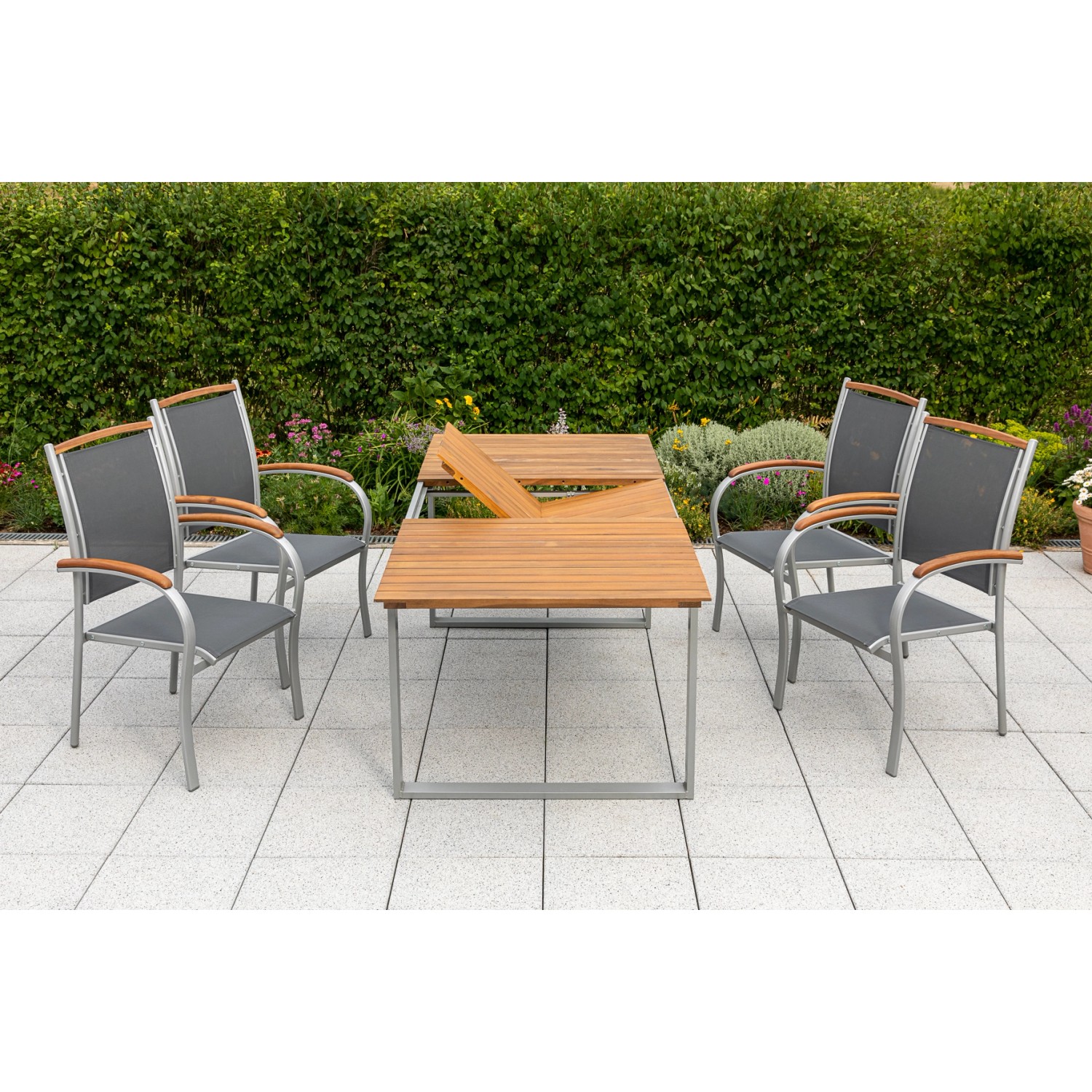 Merxx Siena Gartenmöbel-Set, 5-teilig: Ausziehbarer Tisch und 6 Stapelsessel mit Akazienholz und Textilbespannung.