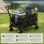 Schwarzer faltbarer Tectake Bollerwagen Rollrider mit Campingausrüstung am See. Robuste Kunststoffräder, Teleskopgriff.