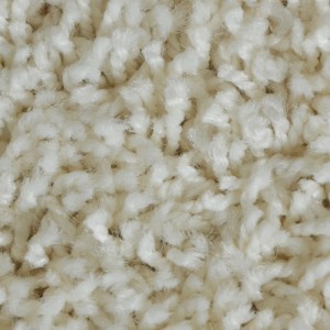 Detailaufnahme: Cremefarbener KARAT Shaggy Teppich Barcelona mit weichem Flor.