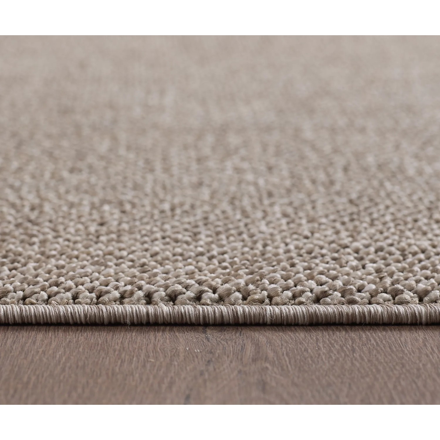 Detailaufnahme: Ayyildiz Kurzflorteppich Loom 4300, braun, mit Schlingenstruktur.