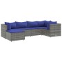 Graues 6-tlg. Garten Lounge Set aus Polyrattan mit blauen Kissen.