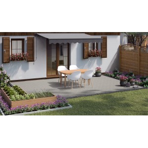 Verbundpflaster Beton Doppel-T Normalstein auf Terrasse mit Gartenmöbeln und Pflanzen.