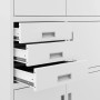 Drei weiße, offene Schubladen des JAN NOWAK Aktenschranks FILIP II. Geräumige Büroschrank-Schubladen aus Stahl.